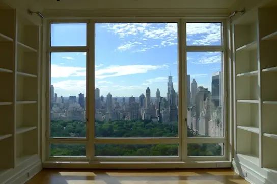 As you can see in this photo, the floor-to-ceiling windows are perfect for the eccentric exhibitionist who likes to simulate coitus with Central Park but doesn't like worrying about nosy neighbors—you're 35 floors up, darling!